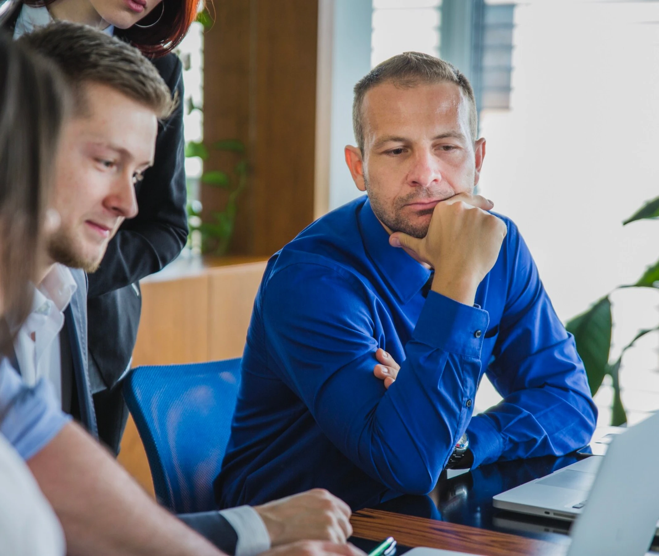 Leaders discussing business insights in a meeting