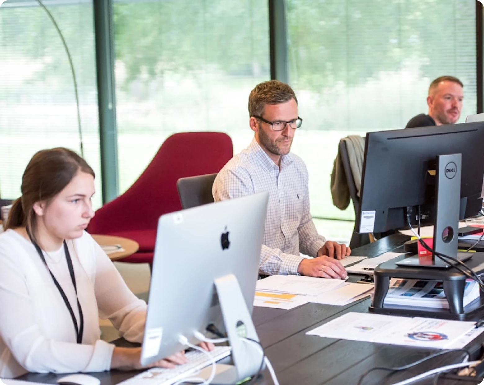 Operations team working at their desks